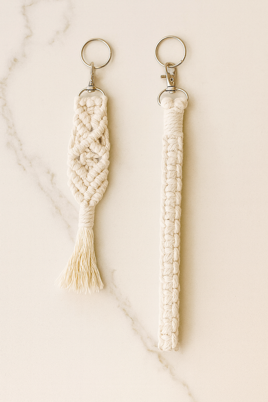 Two macrame keychains on a marble surface